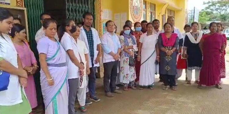 Doctors and health workers sat on demonstration