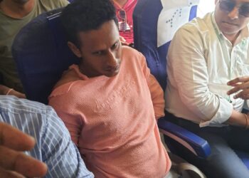 A passenger tried to open emergency exit door mid air got arrested