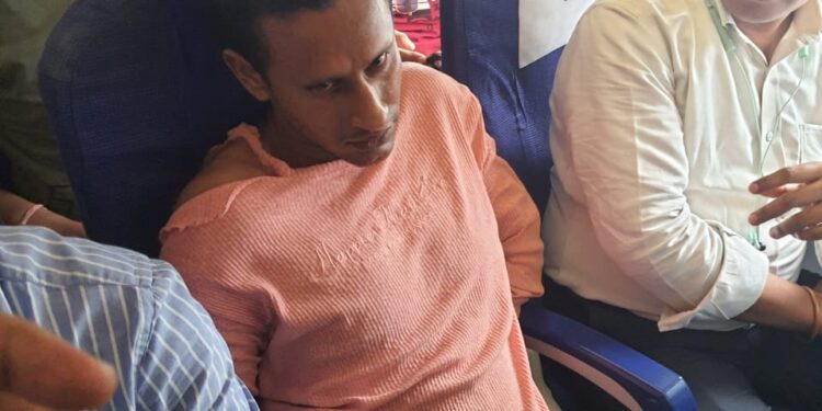 A passenger tried to open emergency exit door mid air got arrested