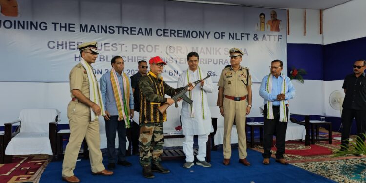 ATTF and NLFT group surrender with arms before CM