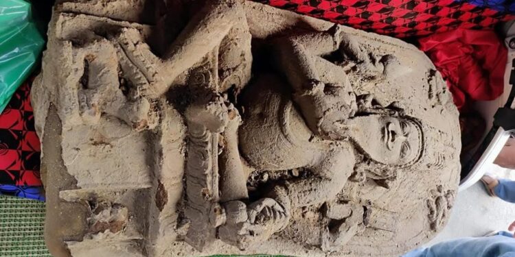 A large stone statue was found buried in Bhuiyapara