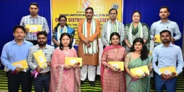 Finance Minister Pranajit Singh Roy distributes appointment letters to 11 newly recruited individuals