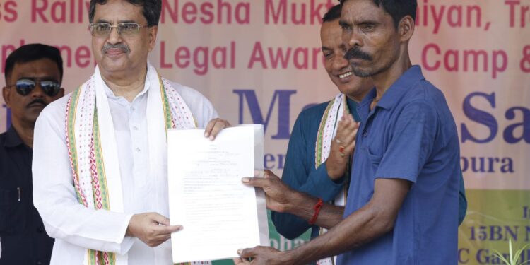 CM distributes pattas to 82 tea garden workers