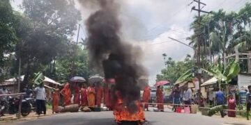 Local ocked roads on Tuesday over a prolonged six-month drinking water crisis