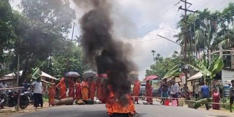 Local ocked roads on Tuesday over a prolonged six-month drinking water crisis
