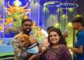 As Maa Durga arrives with her lion, Agartala family takes adopted dog Aimee pandal-hopping
