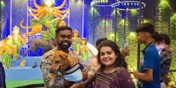 As Maa Durga arrives with her lion, Agartala family takes adopted dog Aimee pandal-hopping