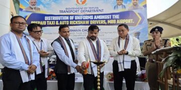 Tripura minister distributes uniforms to taxi, auto drivers to boost tourism
